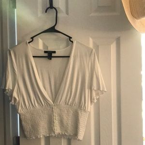 Deep v-neck white blouse. Size large.
